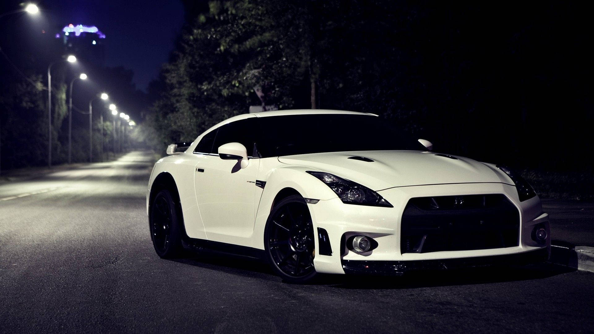 White Nissan Gtr Car On A Dark Road