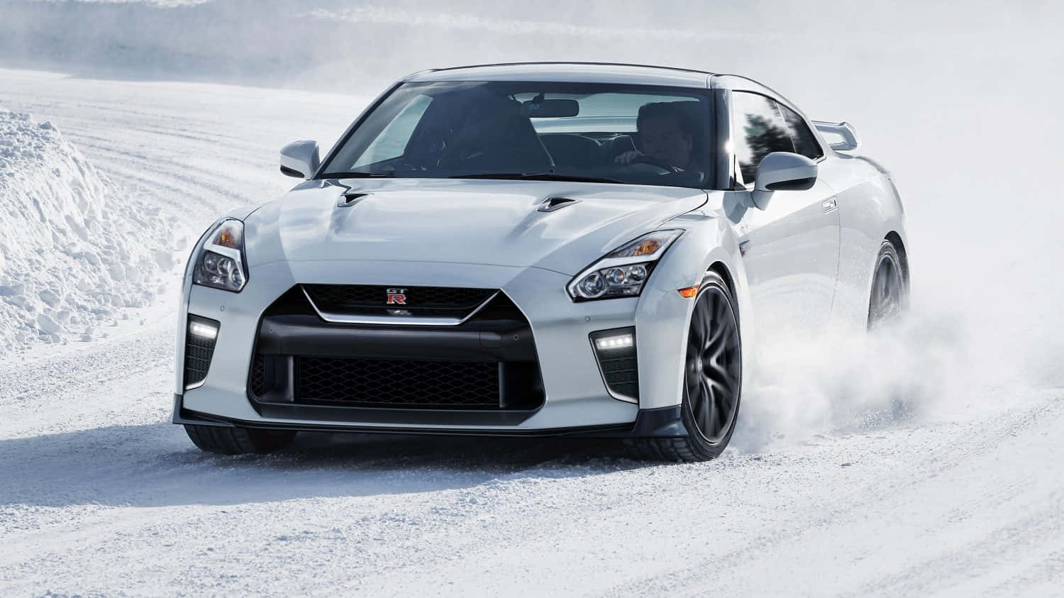 White Nissan R35 Gtr Car Snowy Road Background