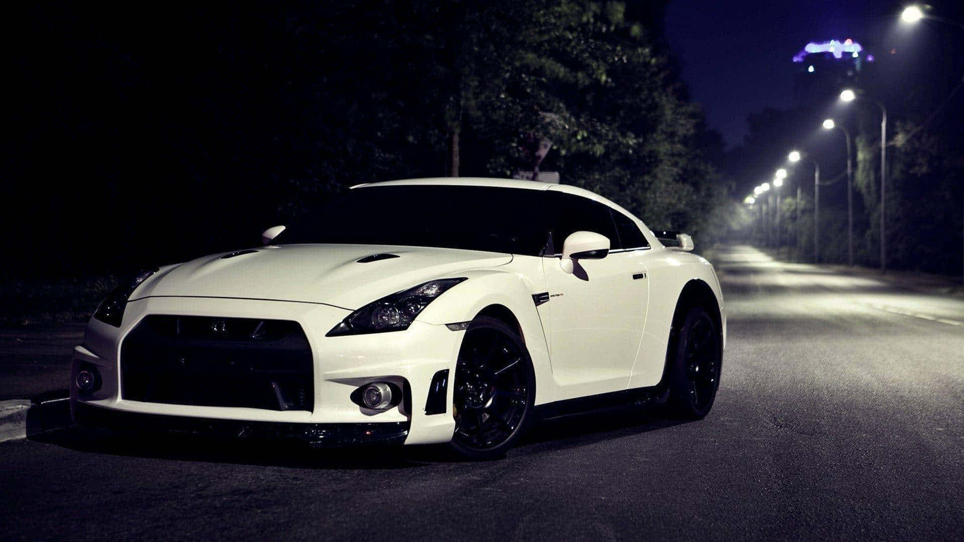 White Nissan R35 Gtr On The Road Background