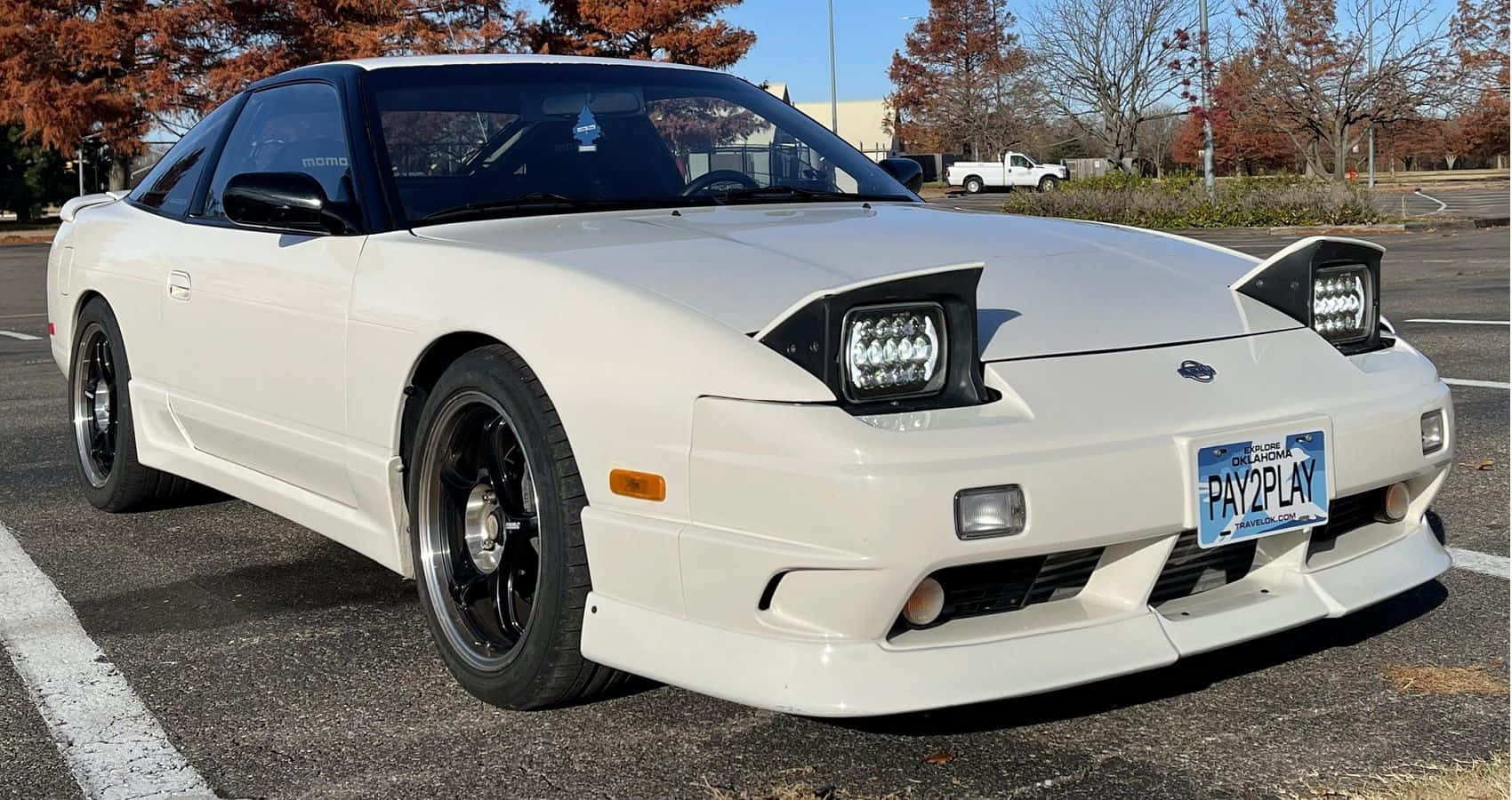 White Nissan240sx Parked Outdoor Background
