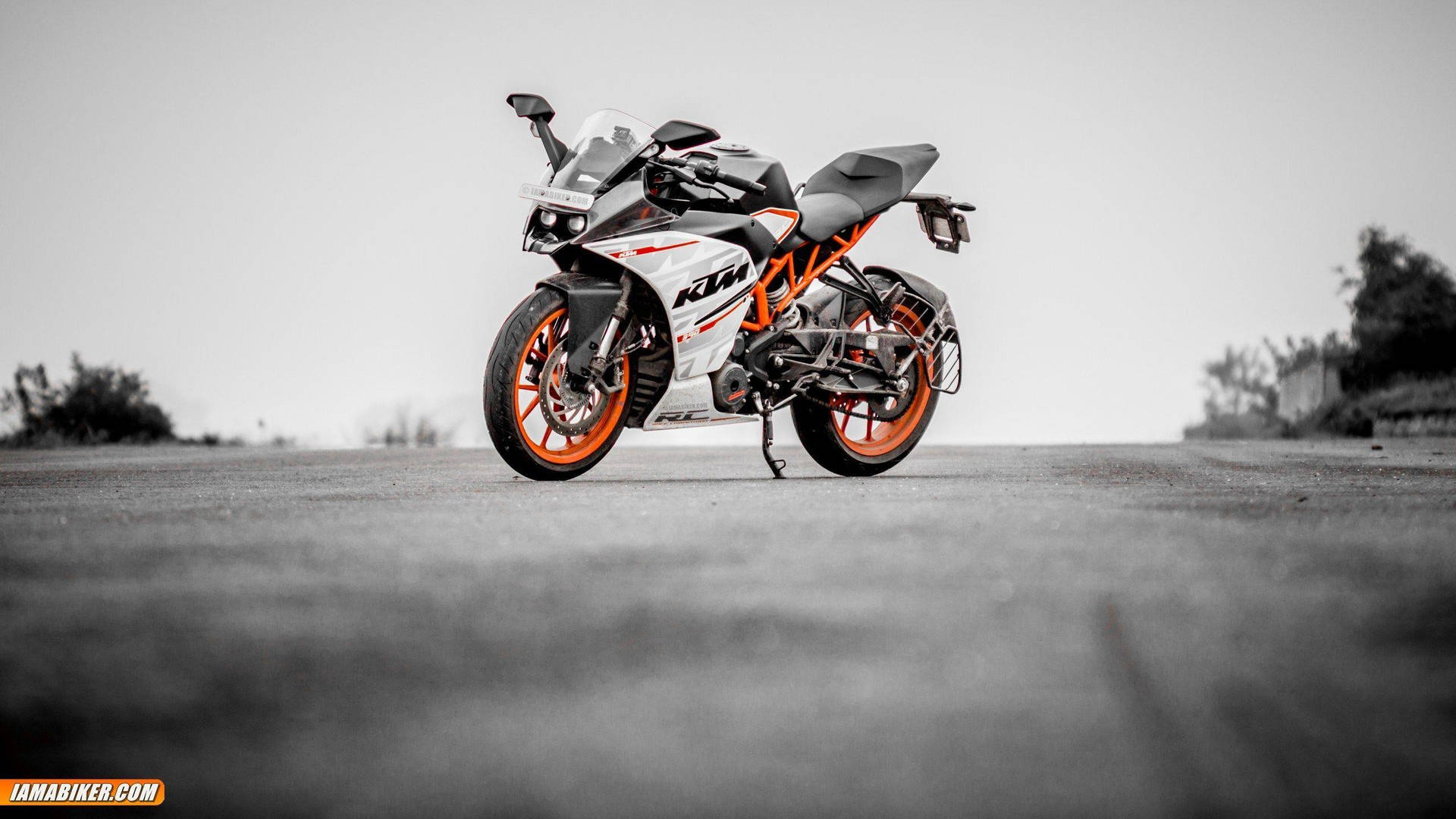 White Orange Ktm Bike On The Road Background