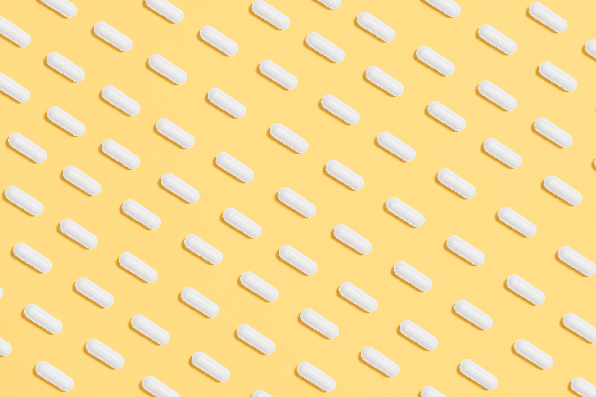 White Pills On A 4k Tablet Background