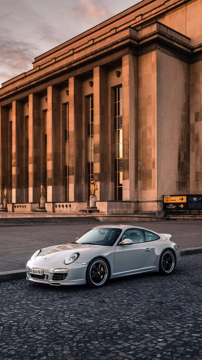 White Porsche 911 Outside Homme Museum