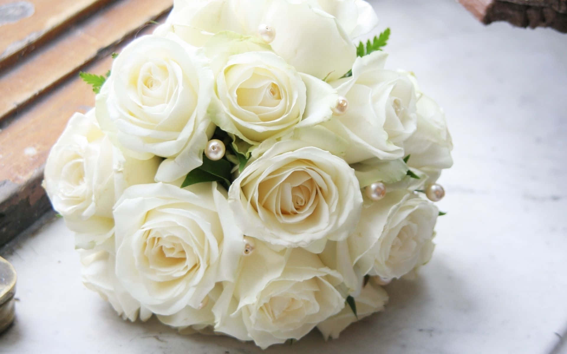 White Roses In A Bouquet On A Table