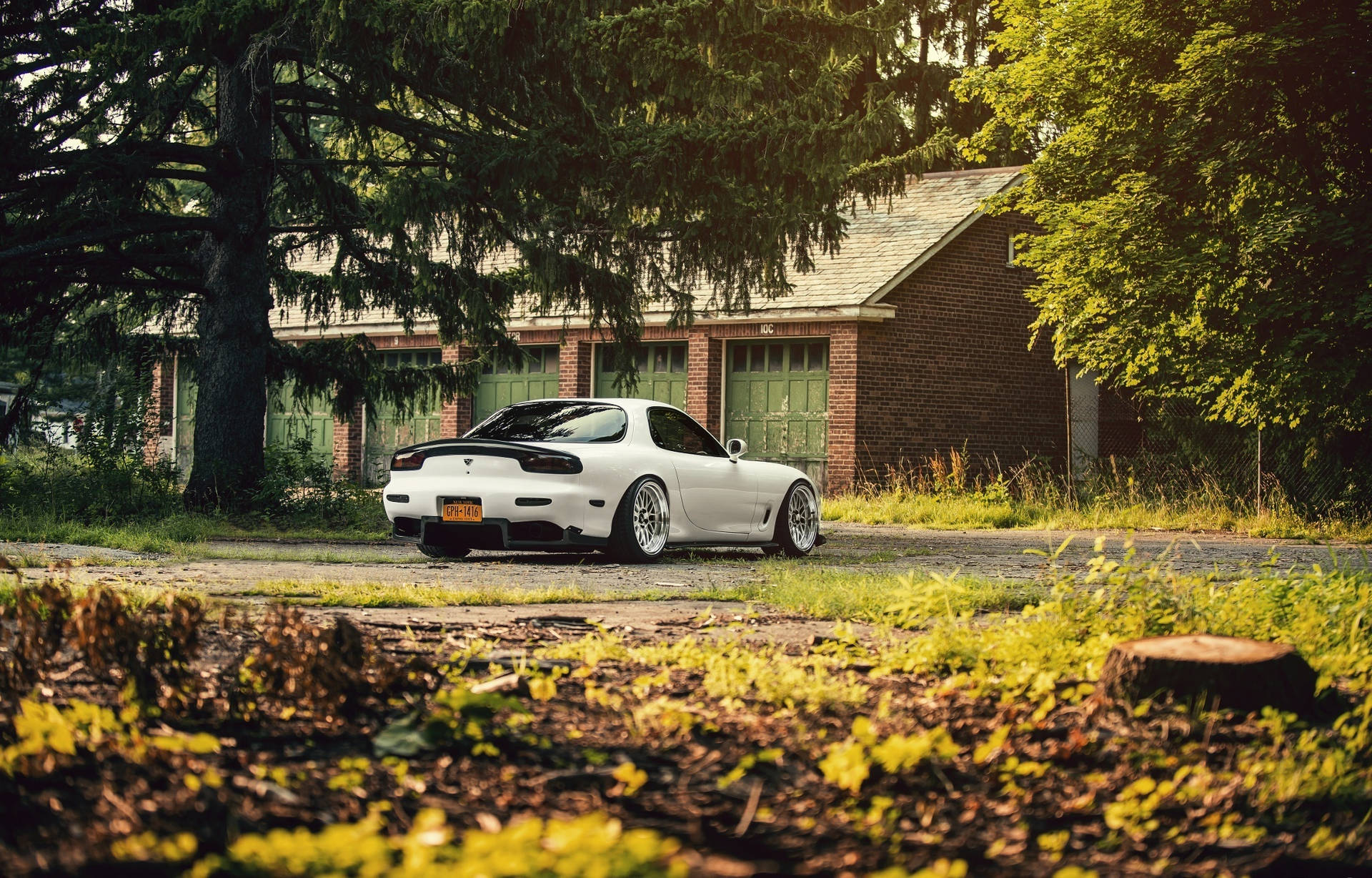 White Rx7 Parked Forest Background