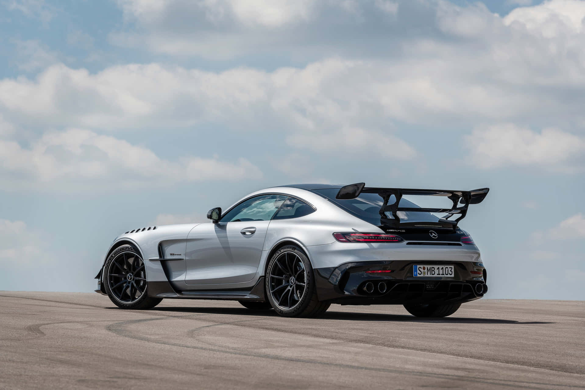 White Silver Mercedes Gts Rear View Background