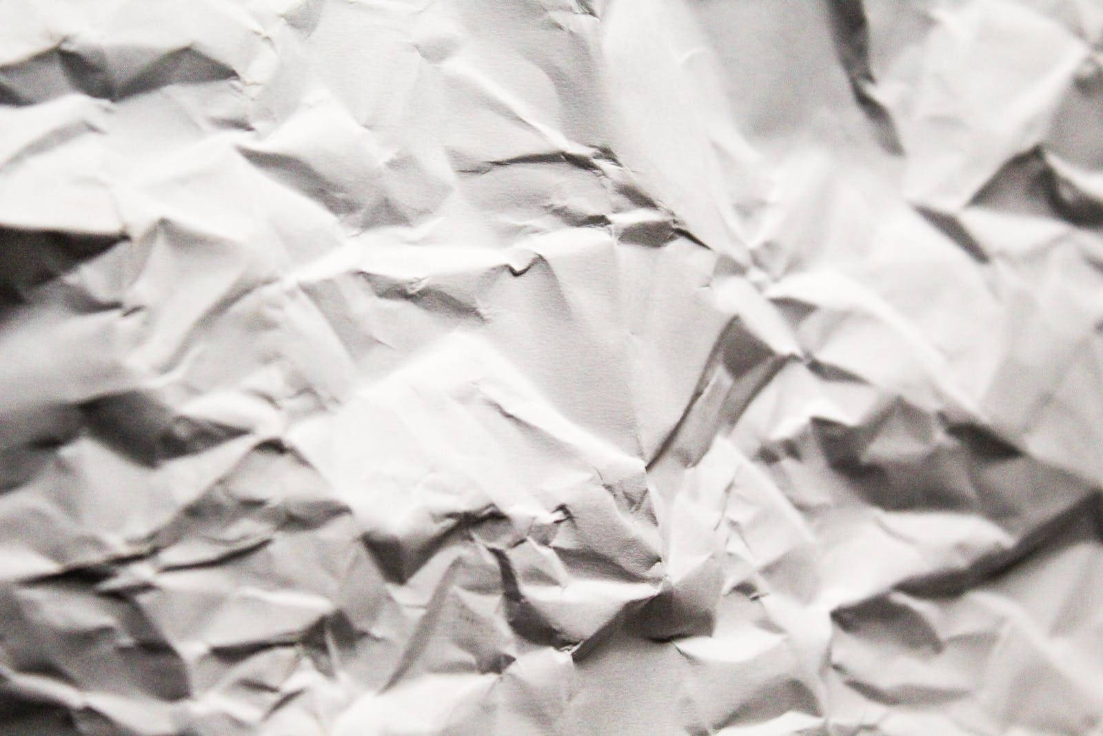 White Very Crumpled Paper Texture Background