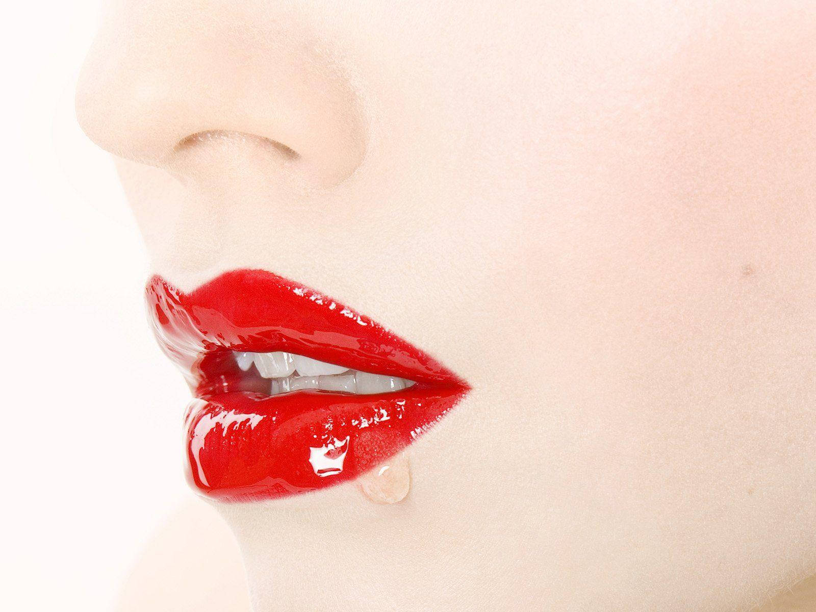 White Woman's Face With Red Watery Lips Background