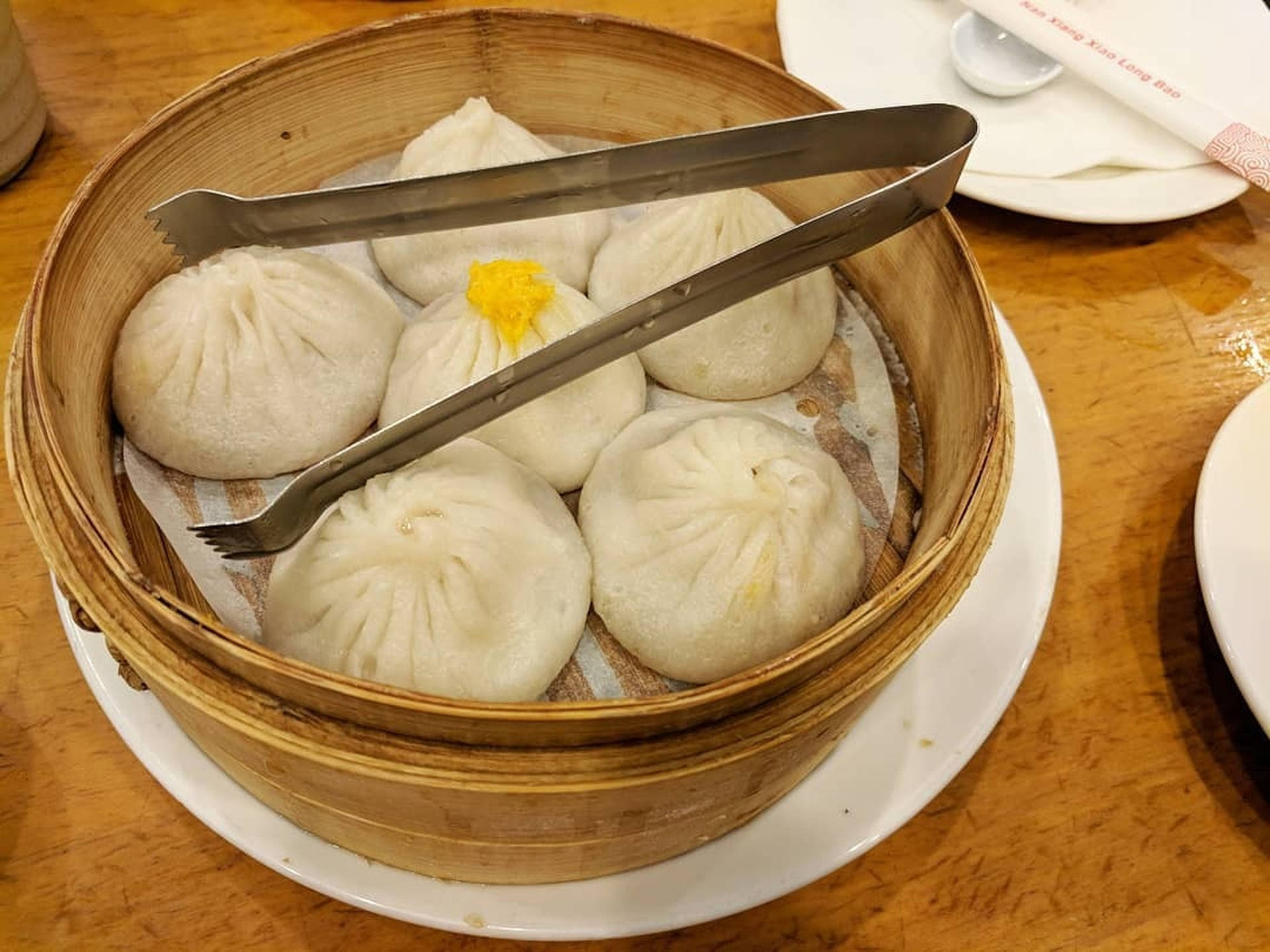 White Xiaolongbao With Metal Tongs