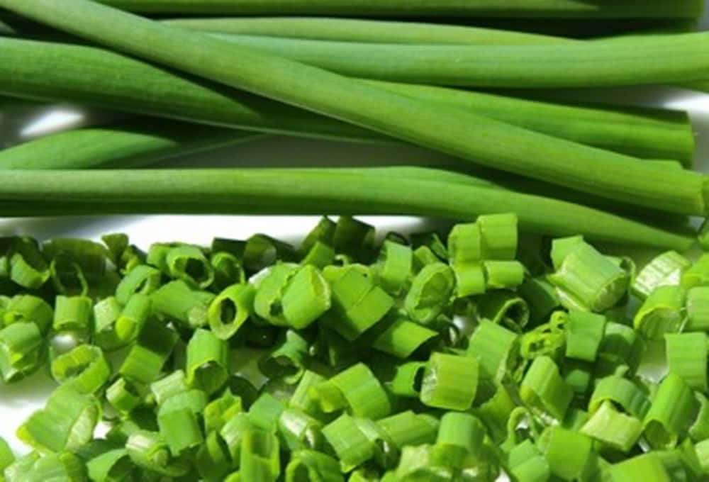 Whole And Chopped Green Chives Background