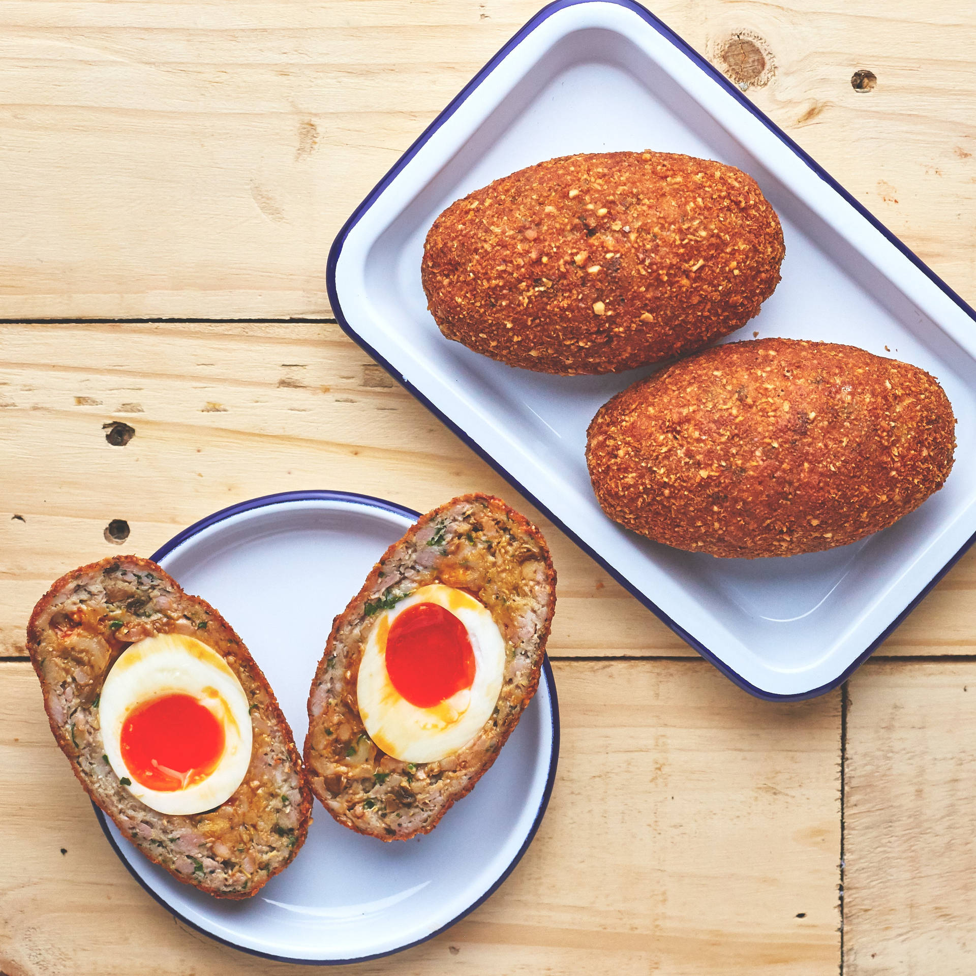 Whole And Half Scotch Eggs Flat Lay Shot Background