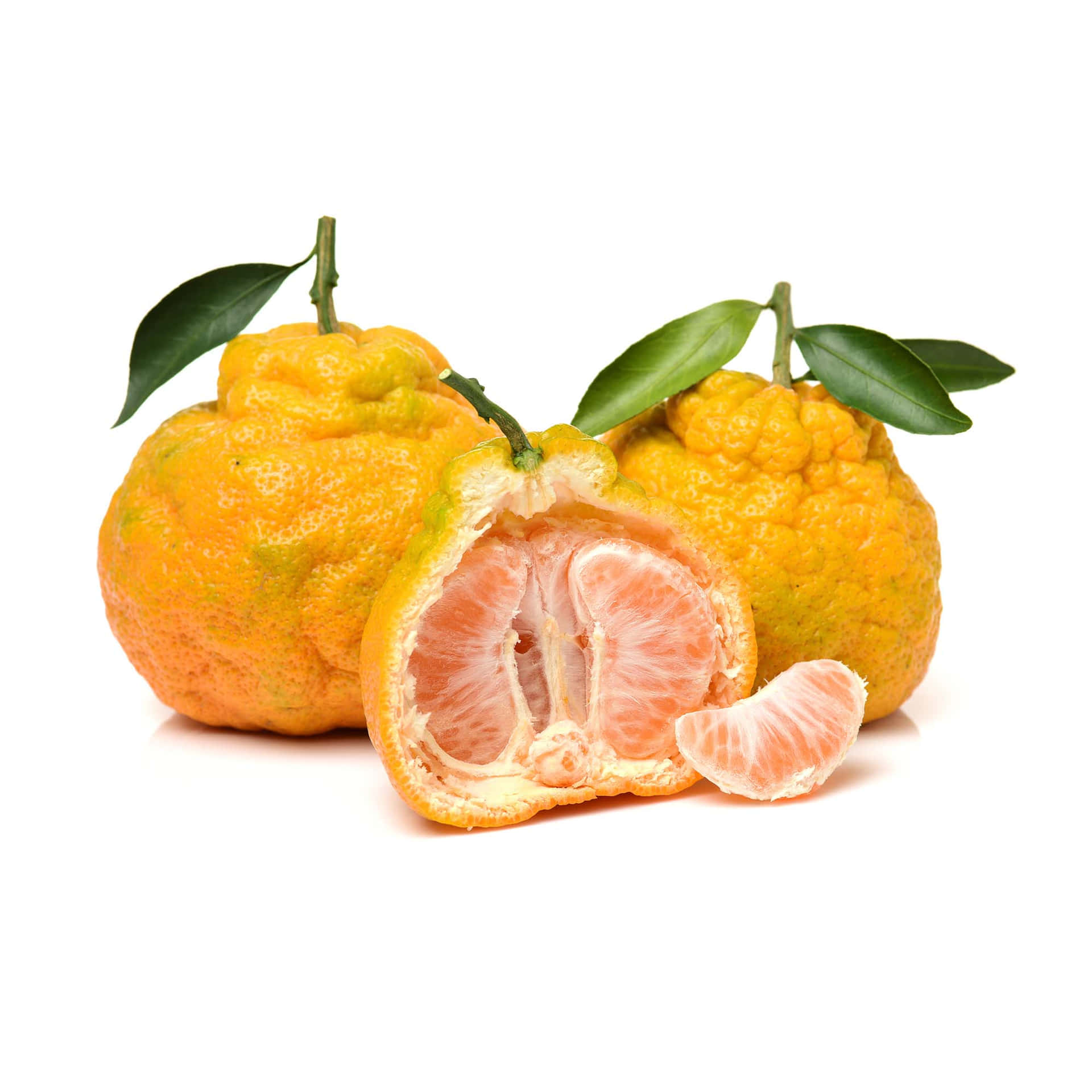 Whole And Open Yellow Ugli Citrus Fruits Background