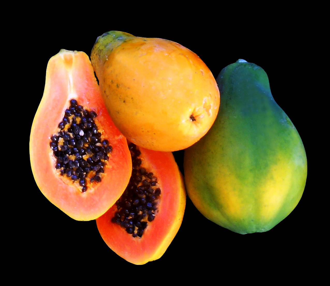 Whole And Sliced Papaya Fruits