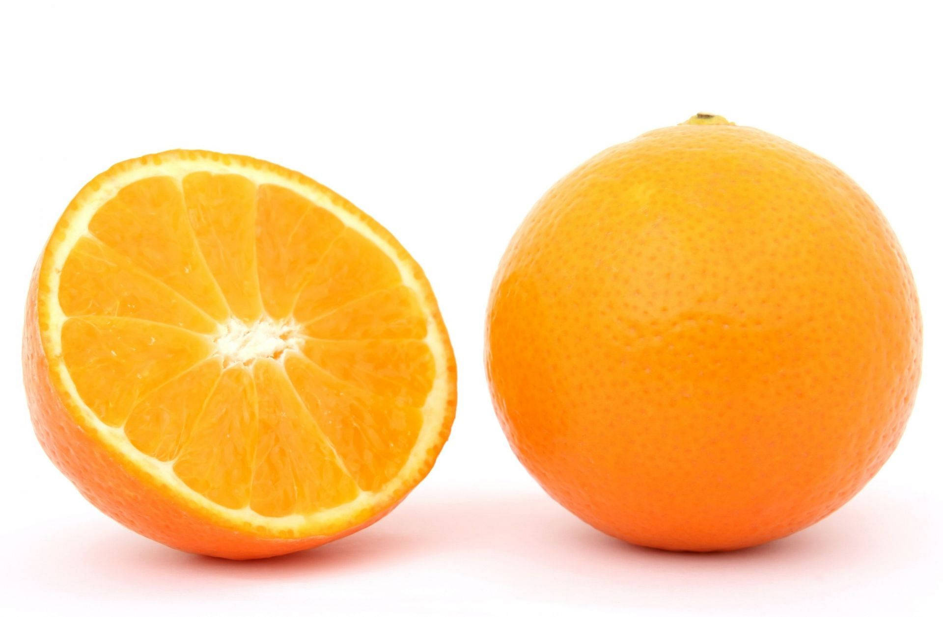 Whole Tangelo Fruit And Half Background