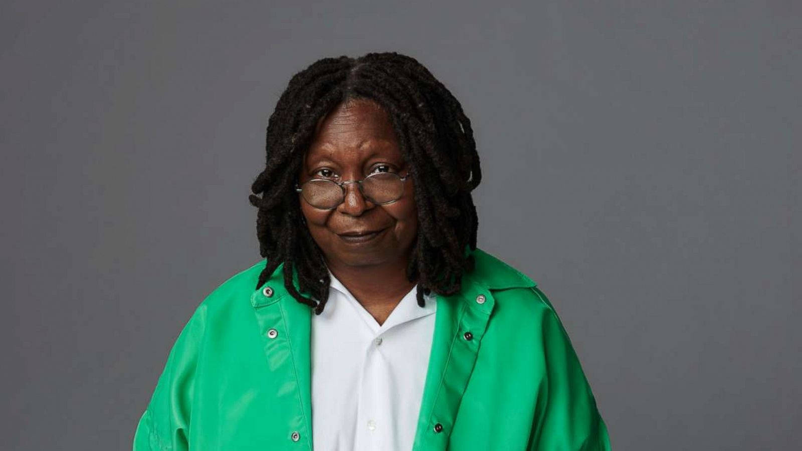 Whoopi Goldberg Engages In Style With A Vibrant Neon Green Jacket.