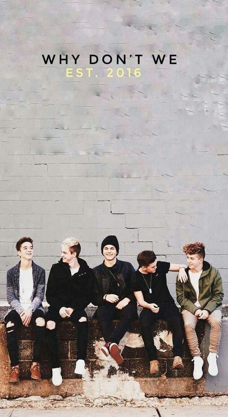Why Don't We By A Group Of Young Men Sitting On A Wall Background