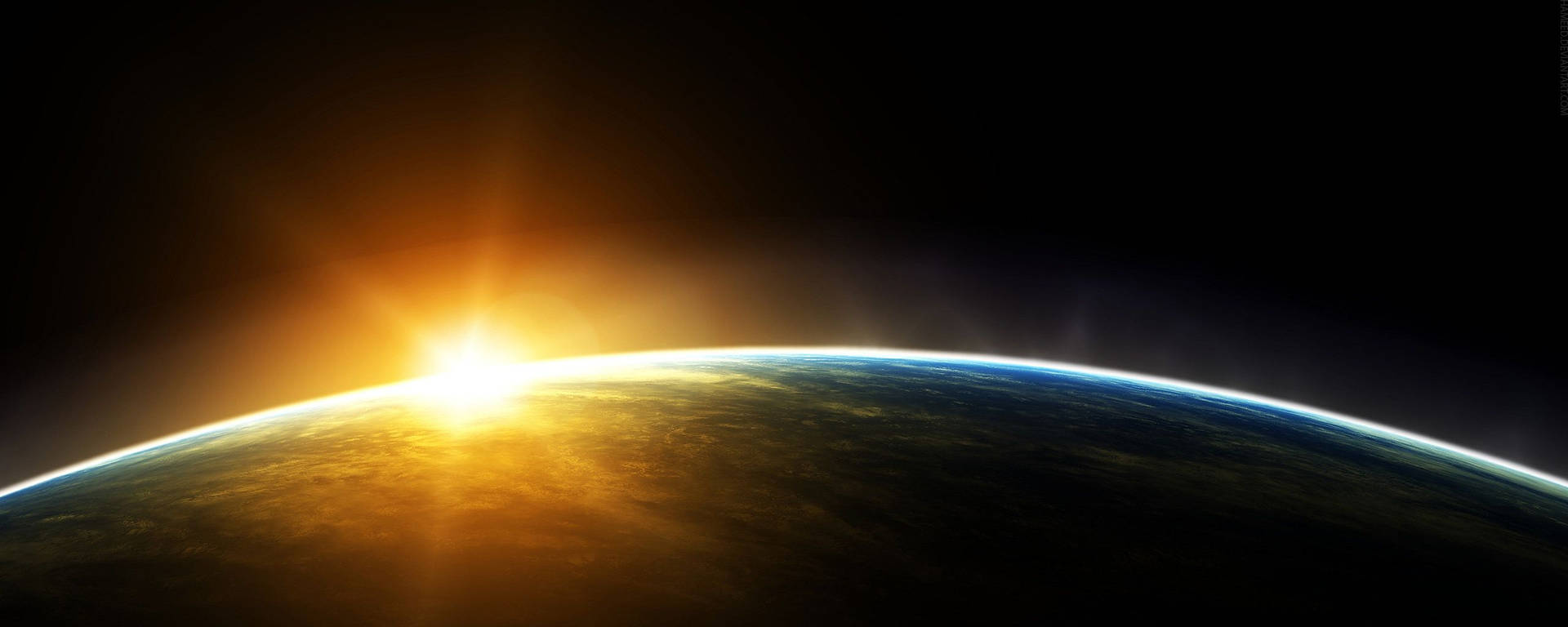 Widescreen Sunrise From Space Background