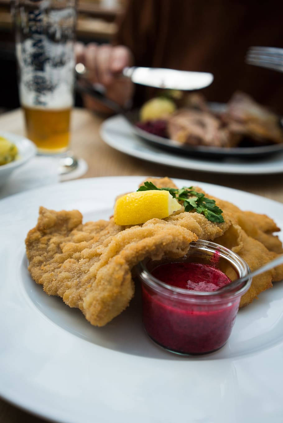 Wiener Schnitzel With Cherry Sauce Background