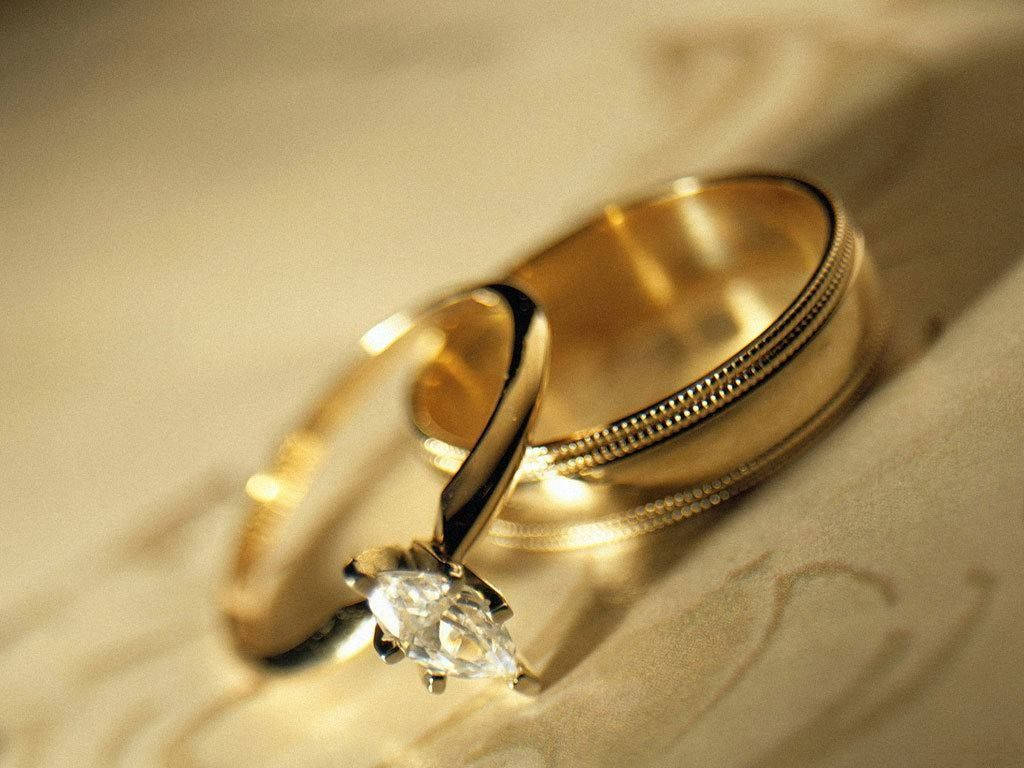 Wife And Husband Wedding Rings Background