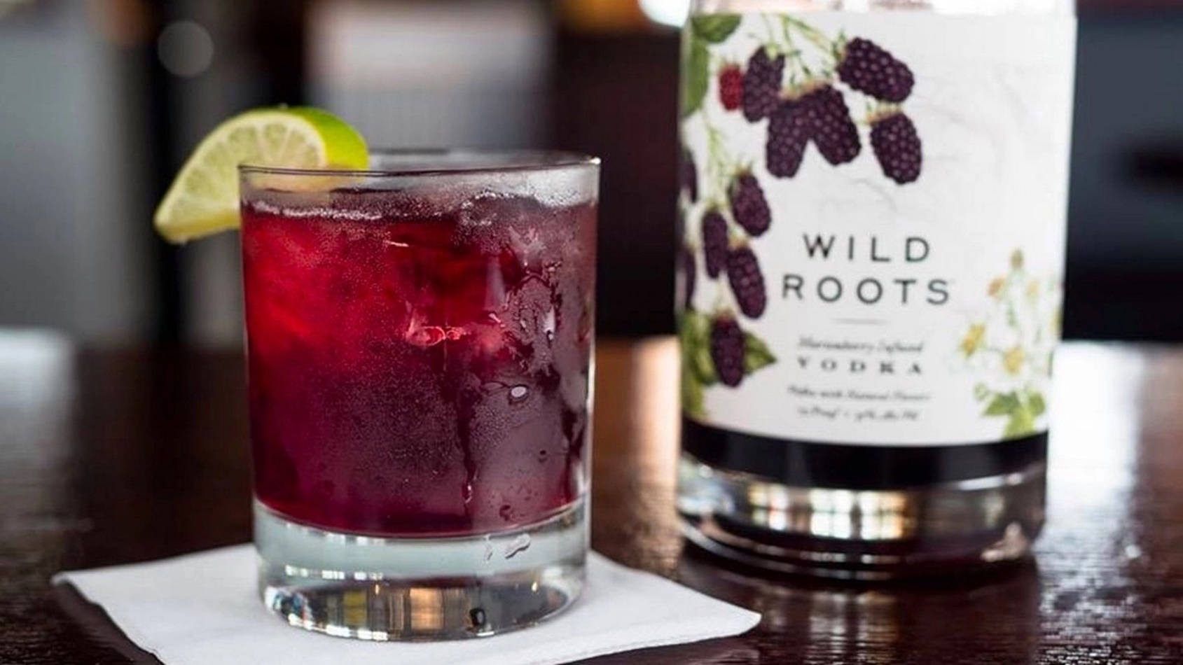 Wild Roots Huckleberry Vodka Lime Cocktail Background