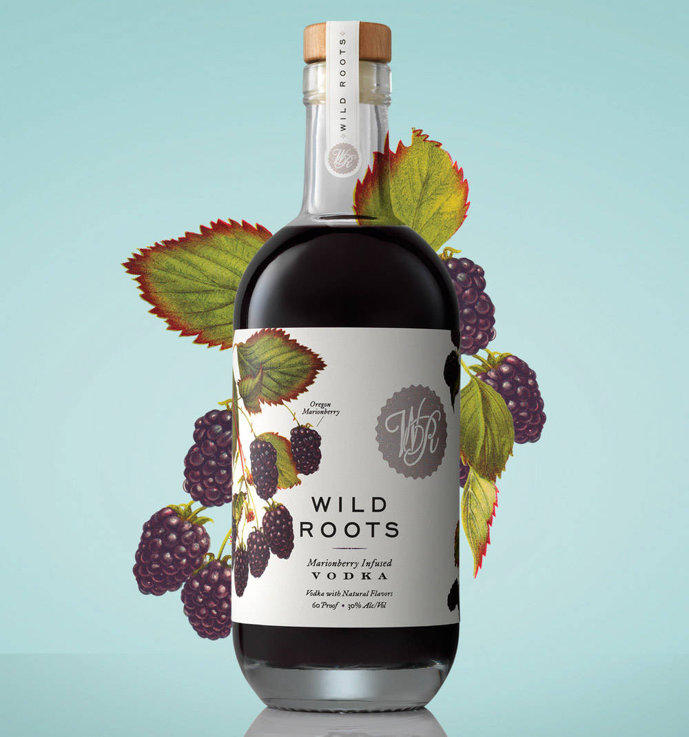 Wild Roots Marionberry Infused Vodka With Fresh Berries Background