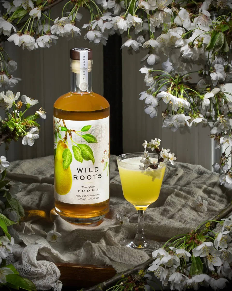 Wild Roots Pear Vodka White Flowers Background