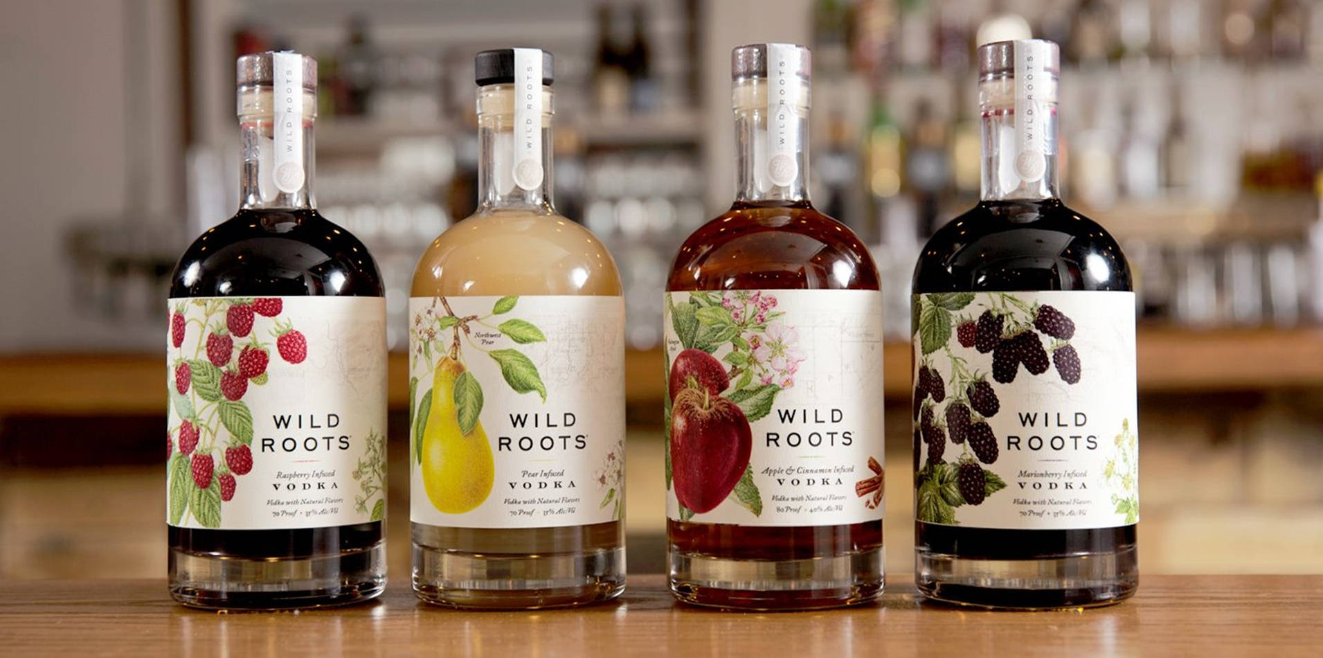 Wild Roots Vodka Bottles Flavors Background