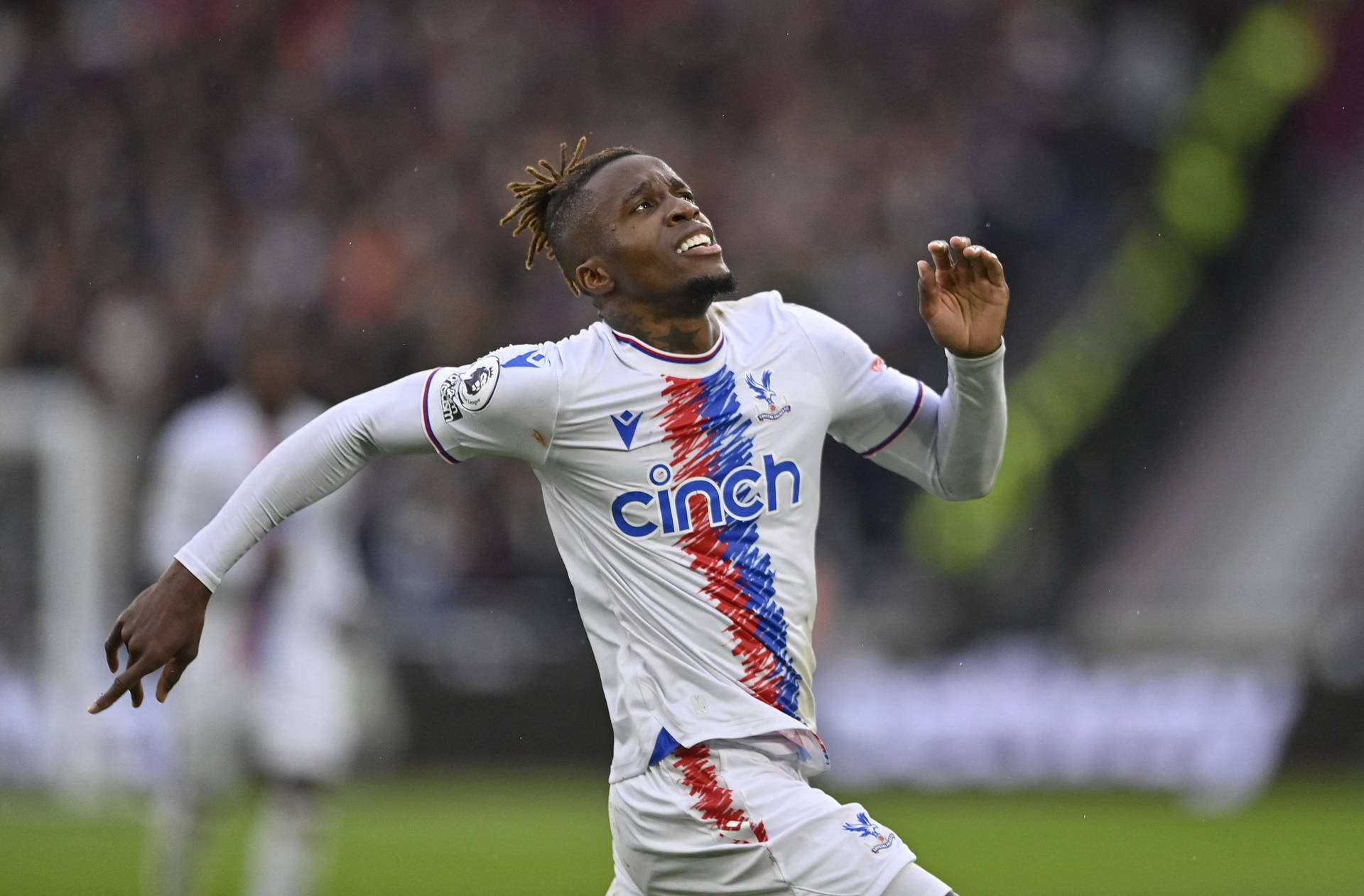 Wilfried Zaha In White Long Sleeves Background