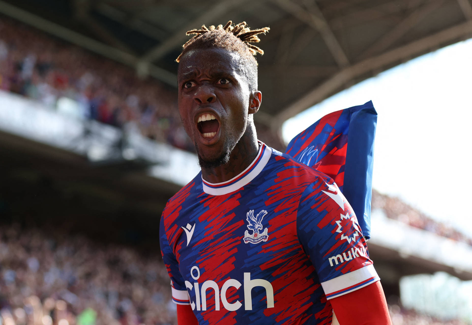 Wilfried Zaha Shouting Aggressively Background