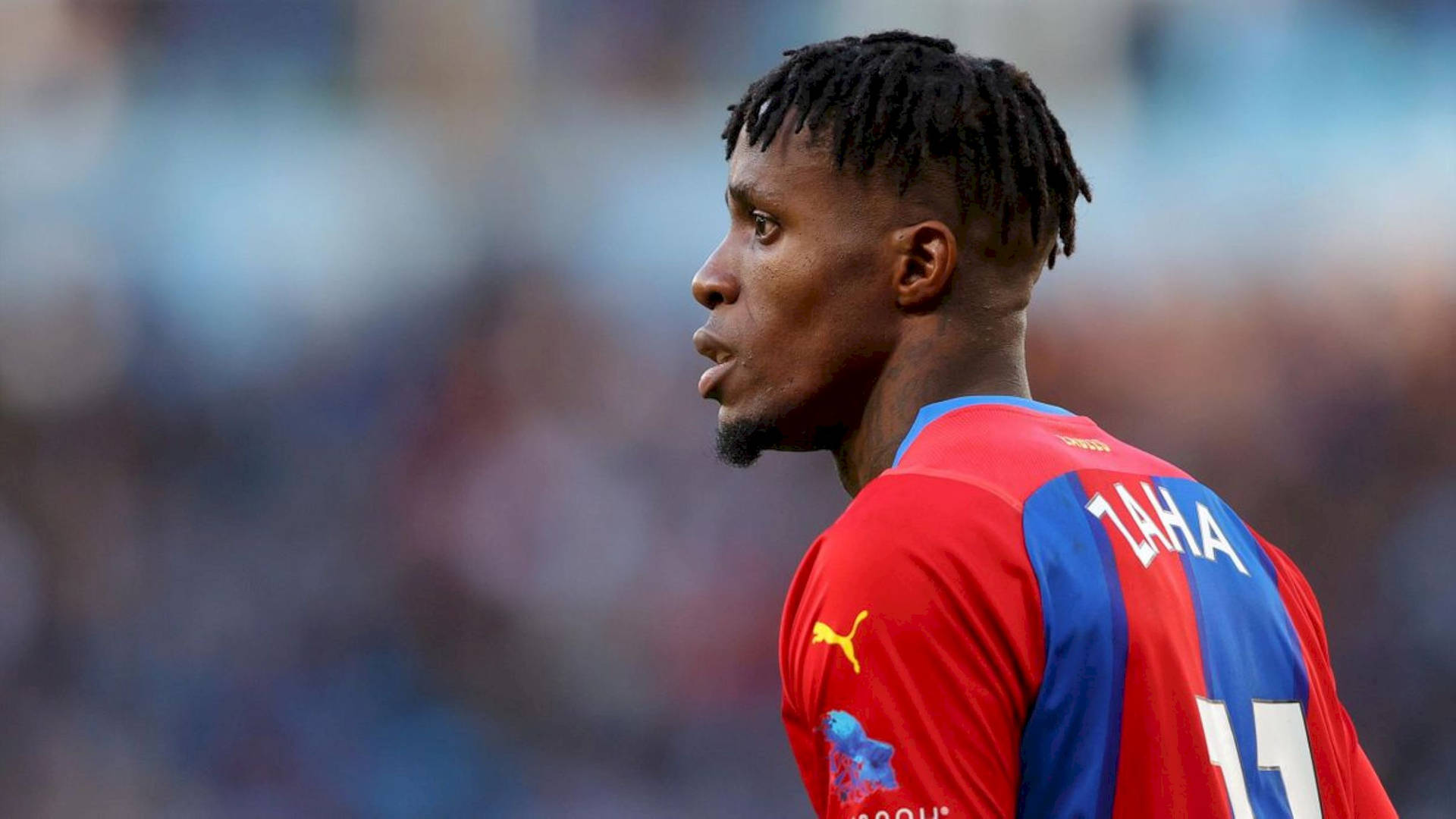 Wilfried Zaha Side Profile Close Up Background