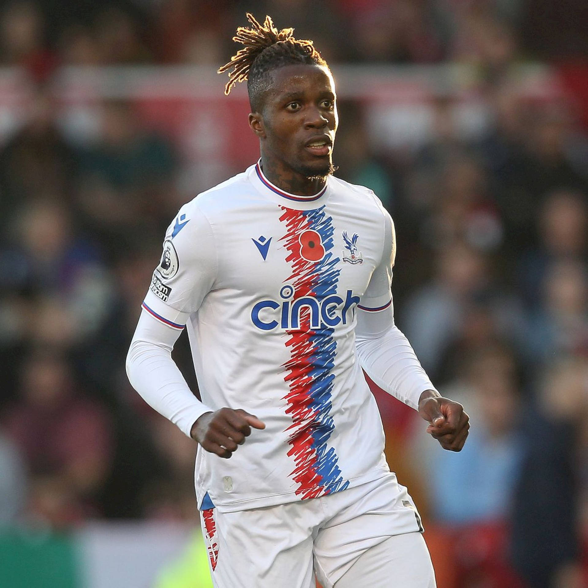 Wilfried Zaha Wearing White Football Uniform