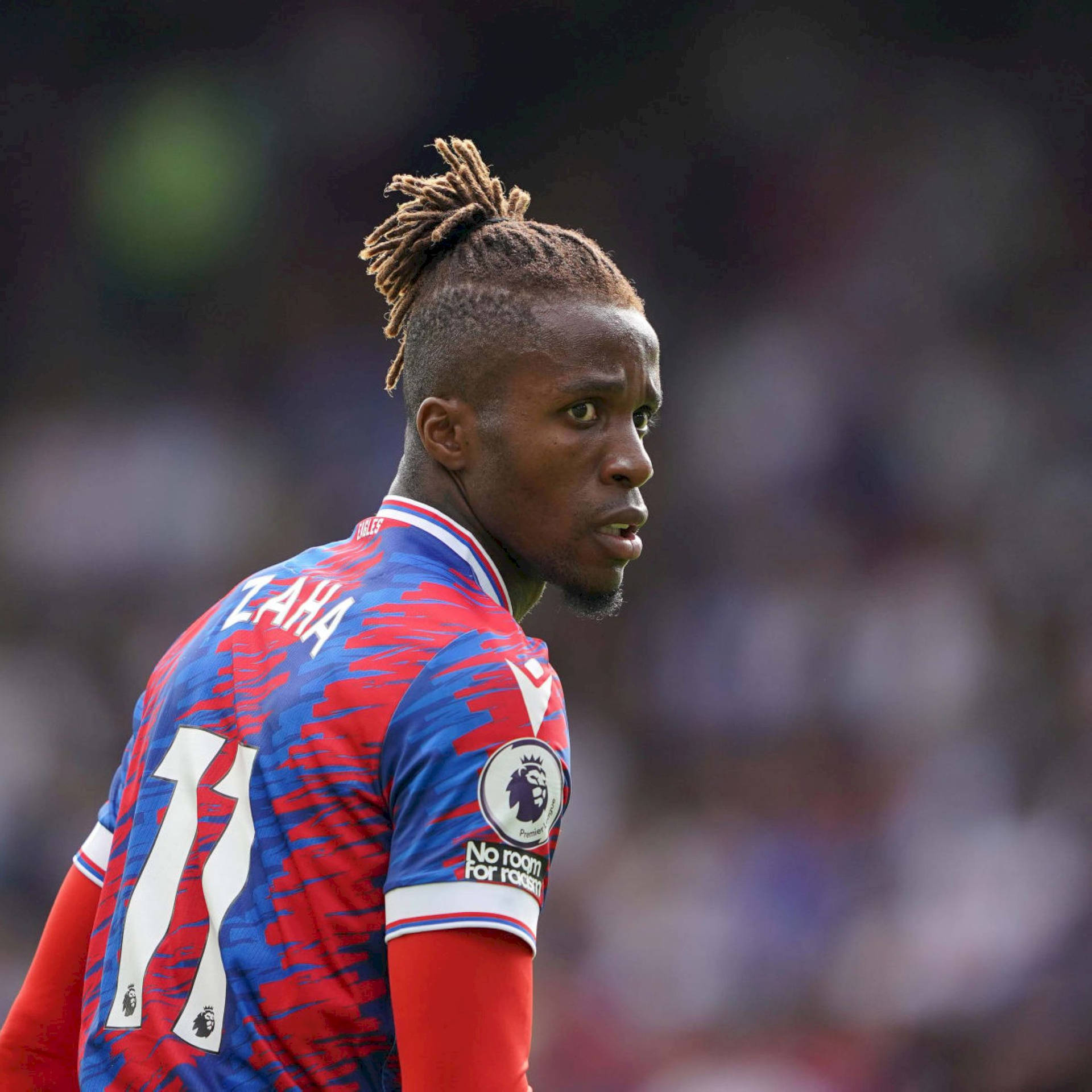 Wilfried Zaha With A Worried Expression Background