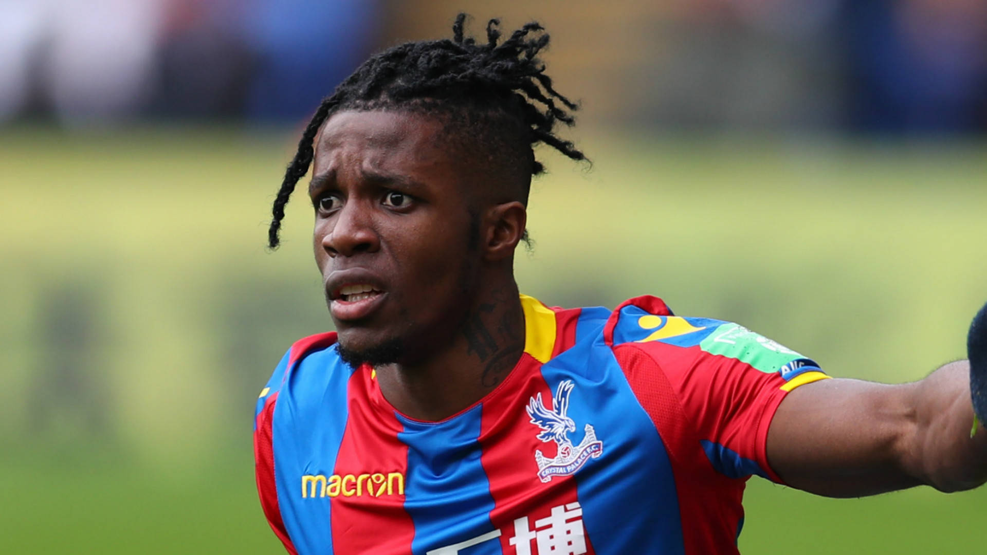 Wilfried Zaha With Hair Tied Up