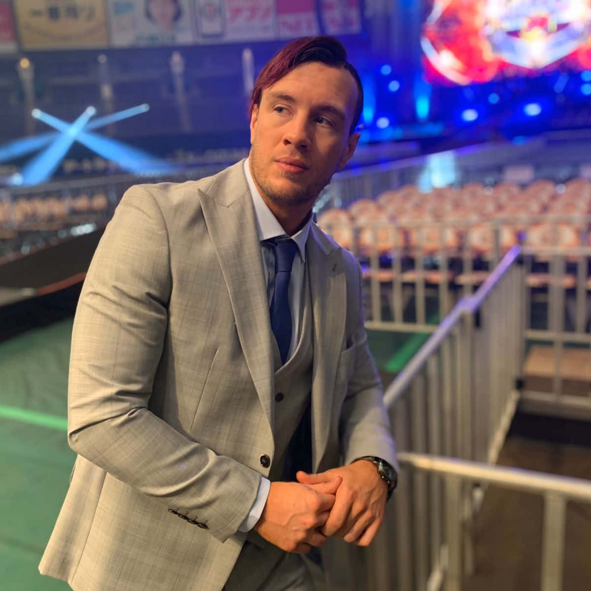 Will Ospreay In Suit Background