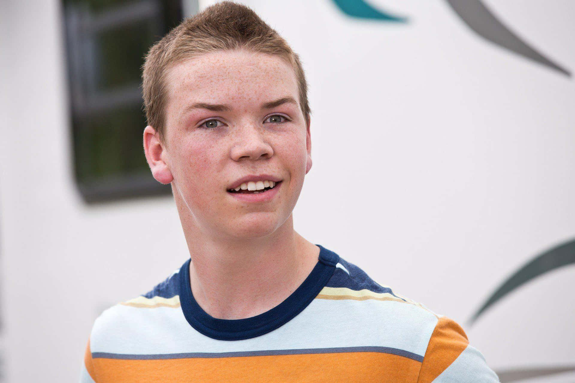 Will Poulter Smiling Portrait Background