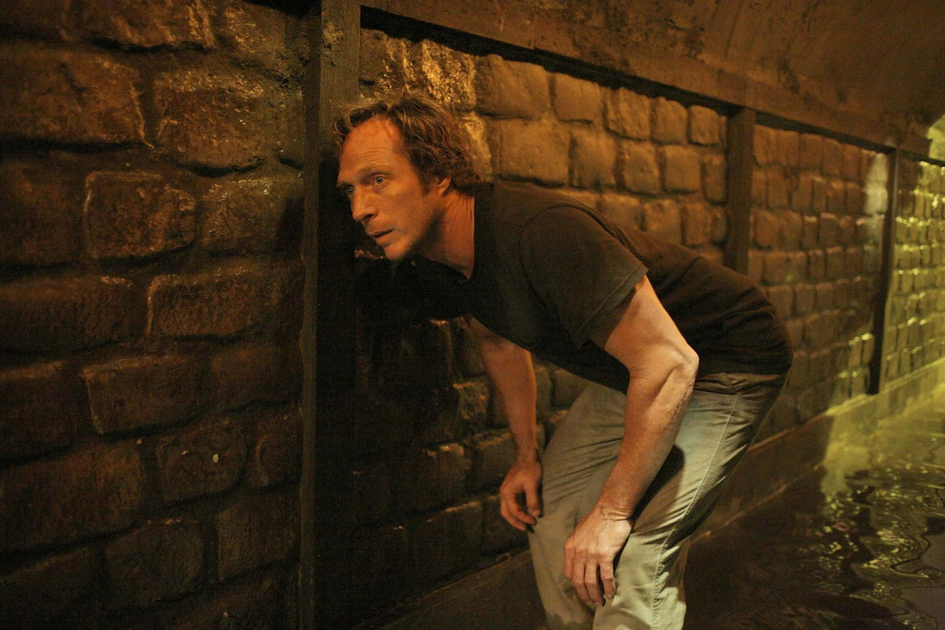 William Fichtner Posing For A Portrait Background
