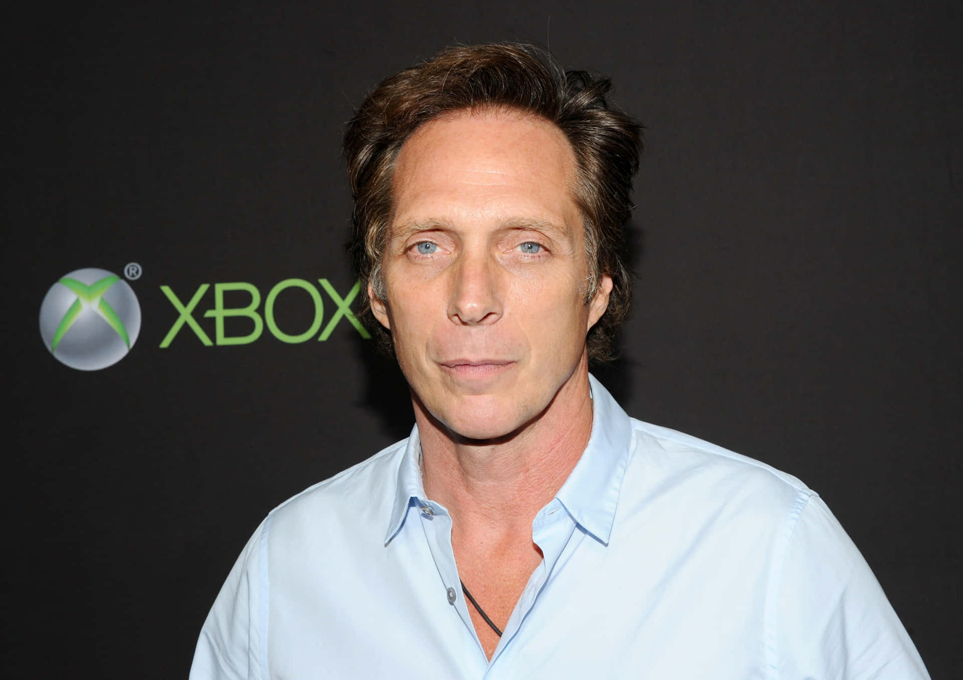 William Fichtner Striking A Casual Pose Background