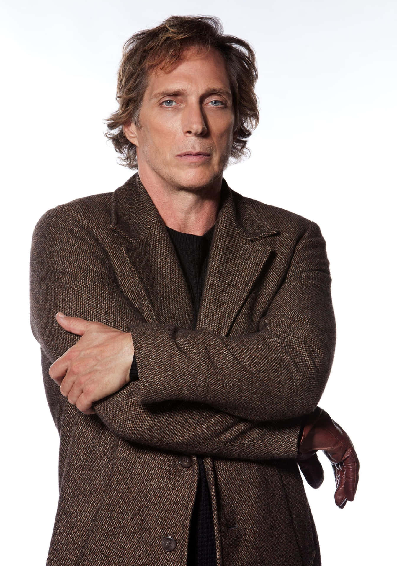 William Fichtner Striking A Pose In A Photoshoot Background