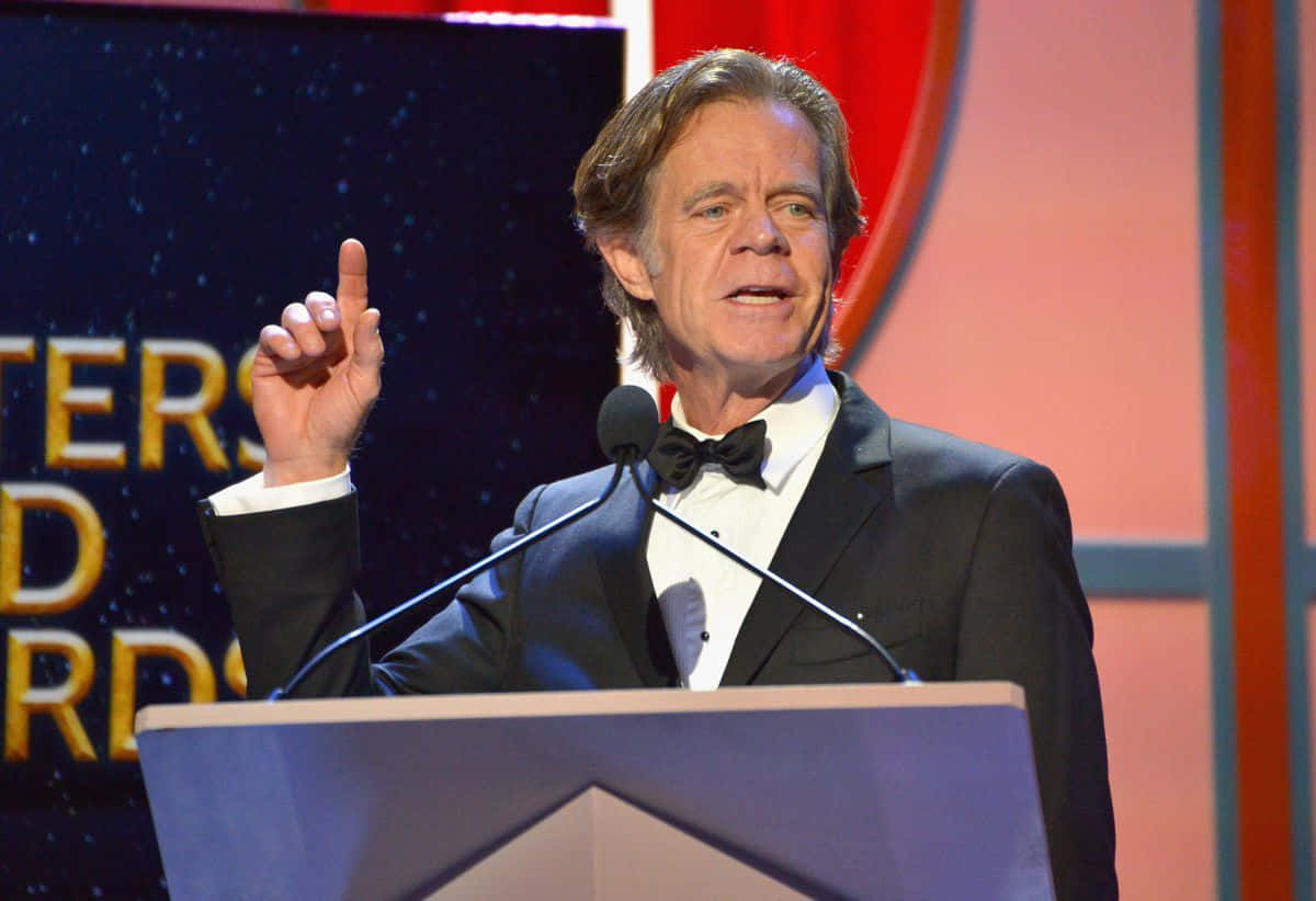 William H. Macy At An Event, Posing With A Captivating Smile.