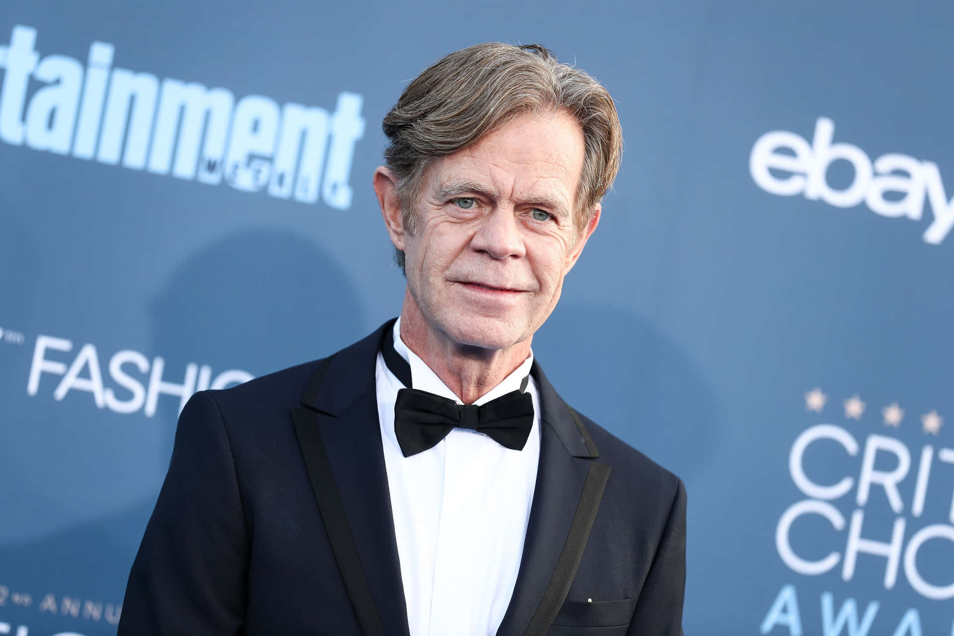William H. Macy Poses On The Red Carpet At A Prestigious Event