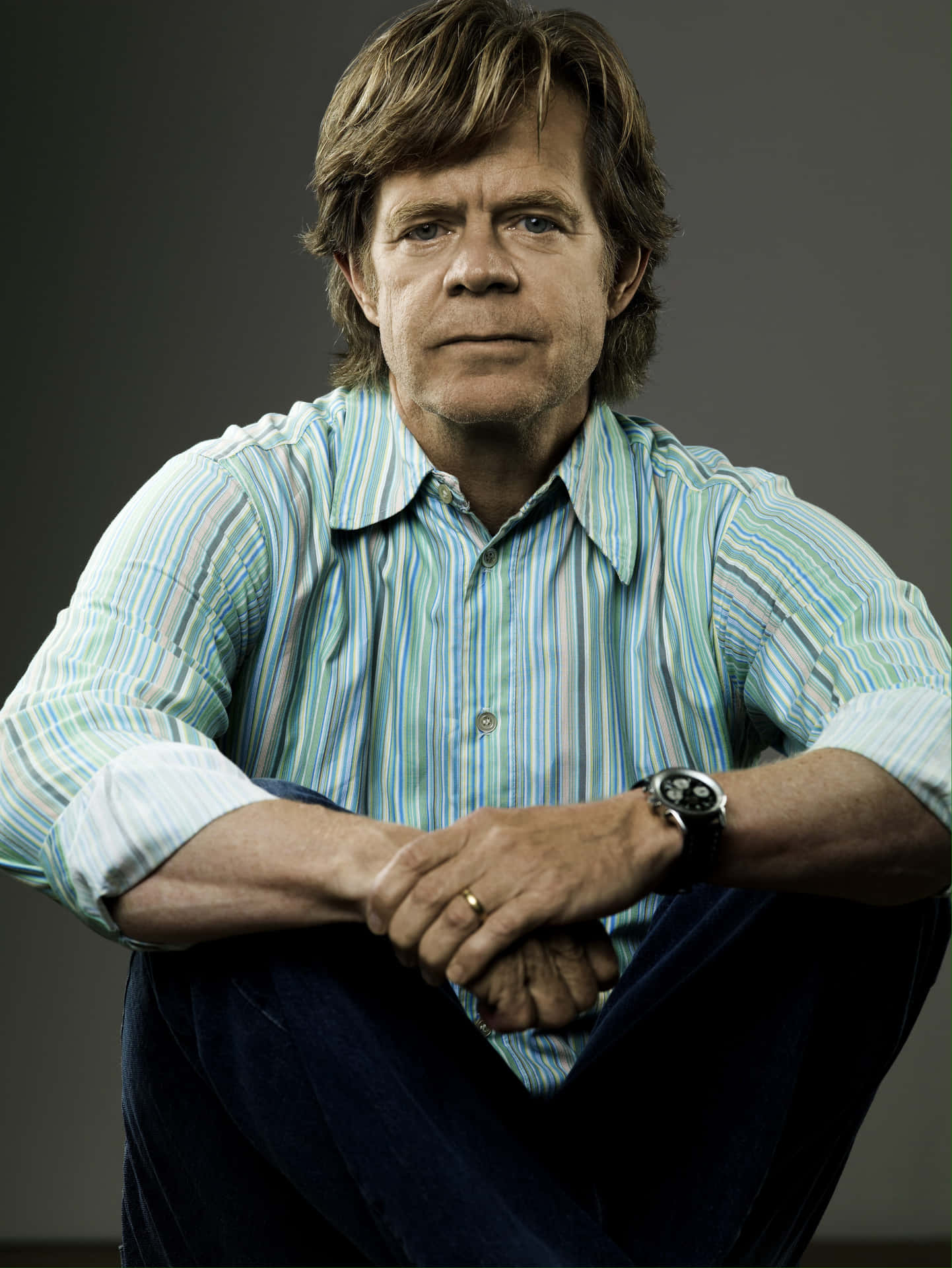 William H. Macy Posing At An Event