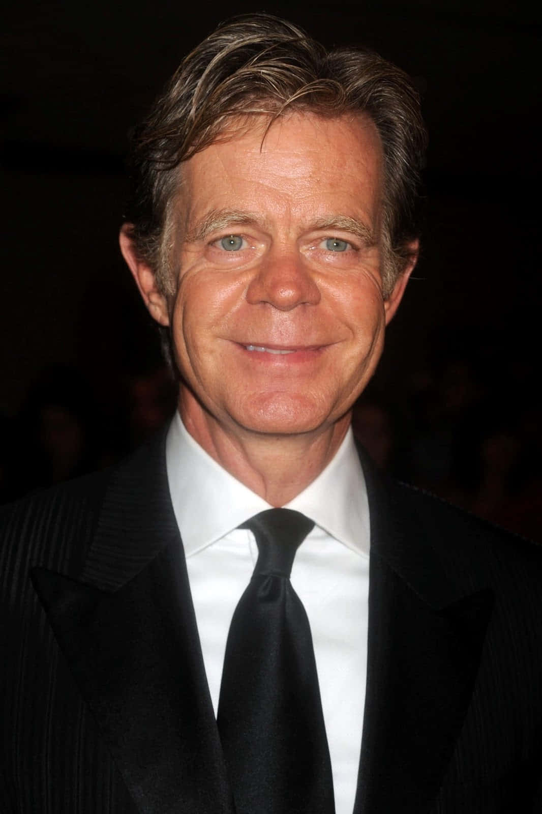 William H. Macy Smiling At An Event