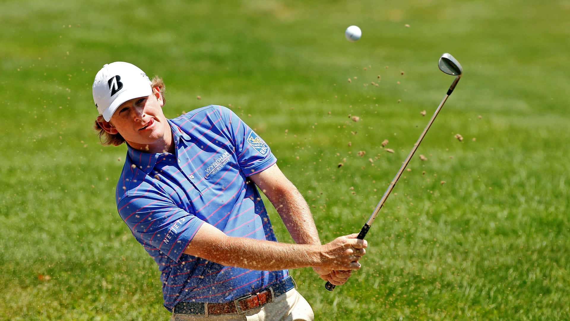 William Mcgirt Hitting A Golf Ball Background