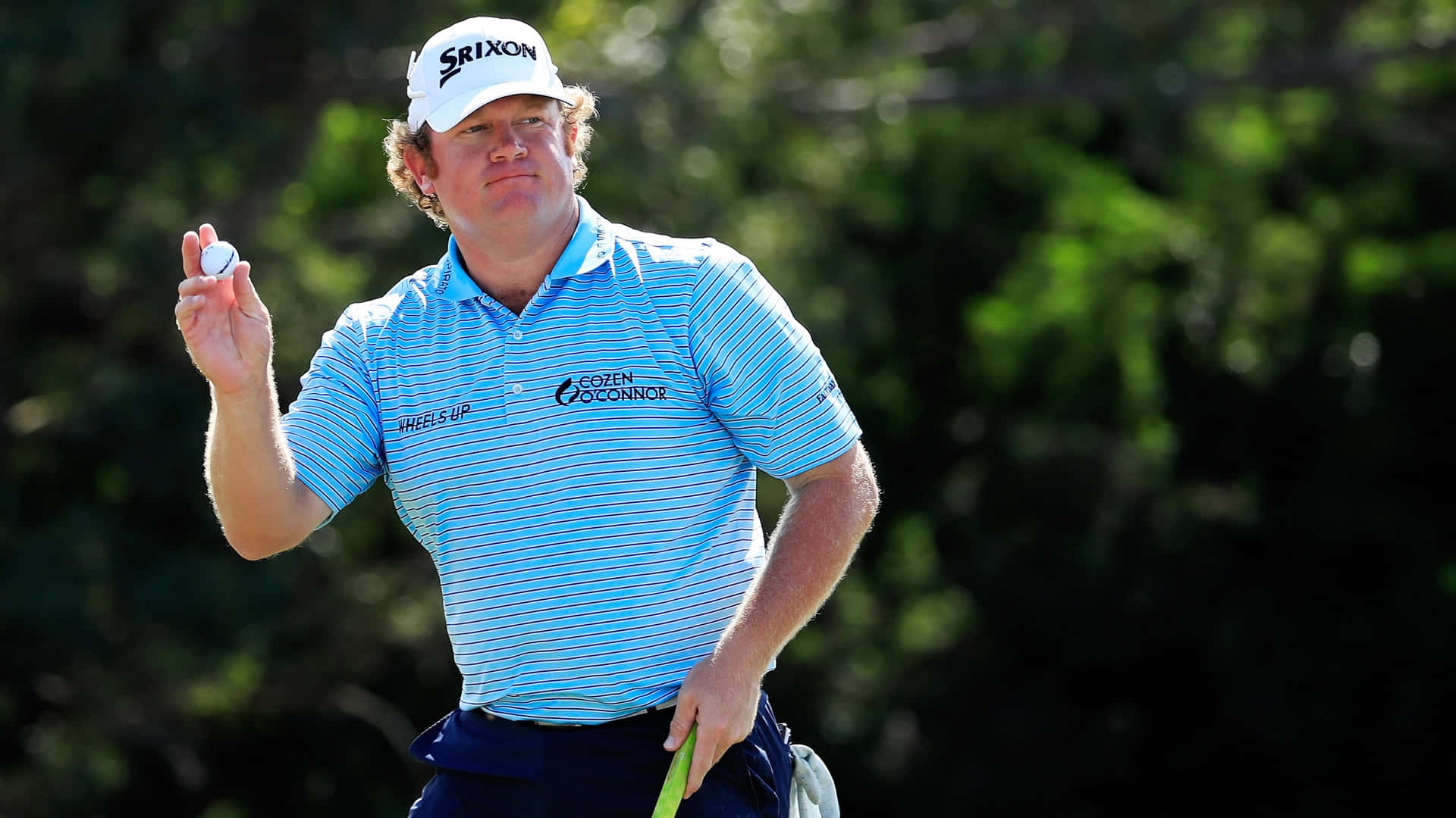 William Mcgirt Holding A Golf Ball Background