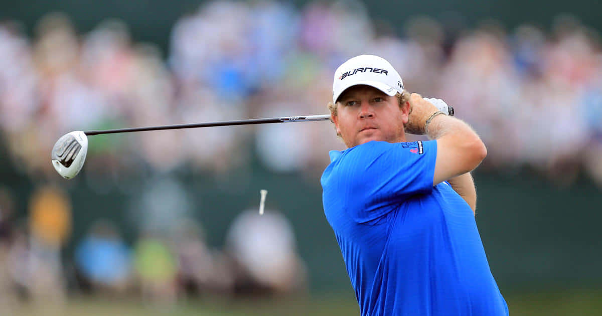 William Mcgirt In A Blue Shirt Background