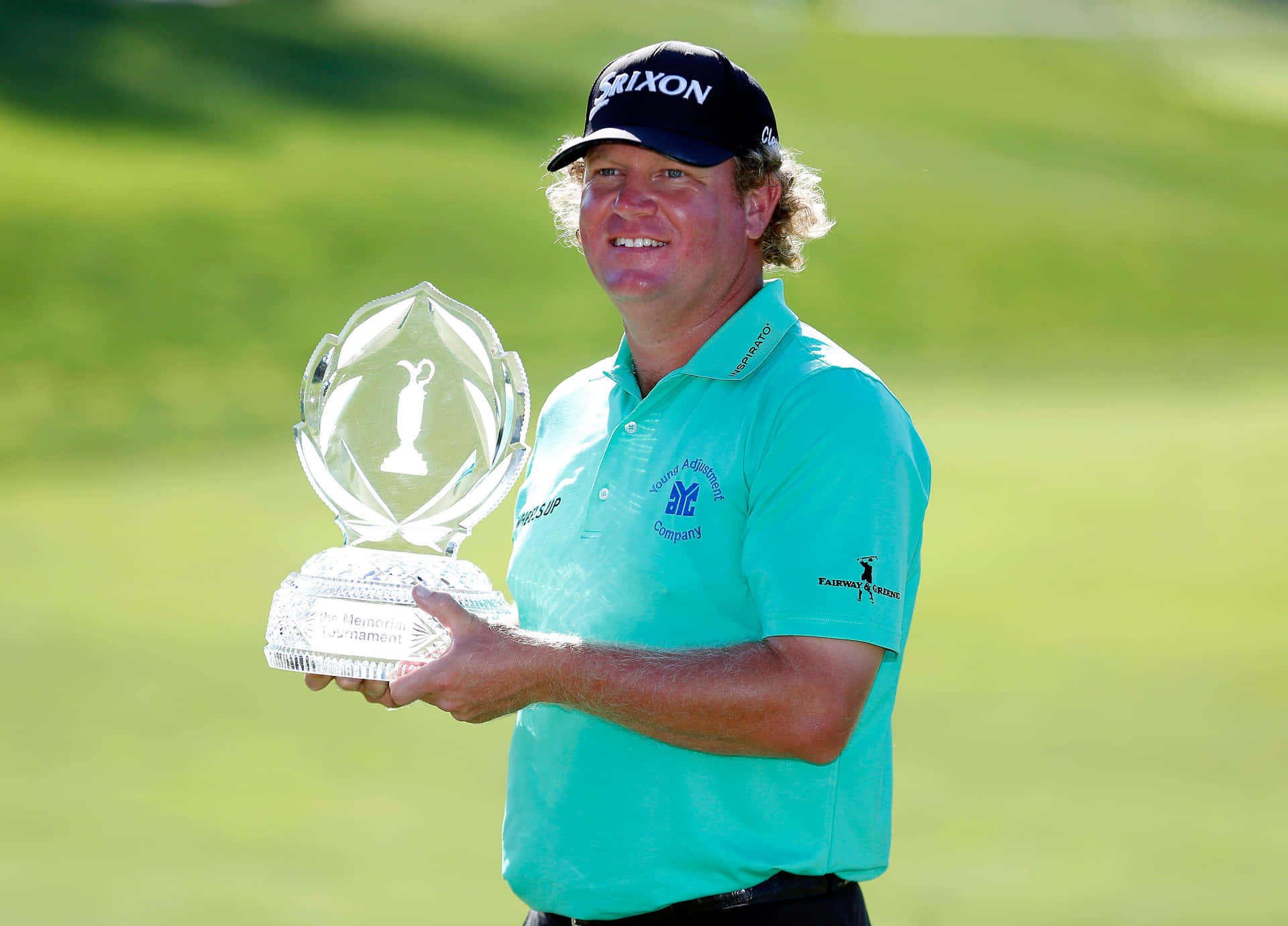 William Mcgirt Triumphantly Holding Championship Trophy Background
