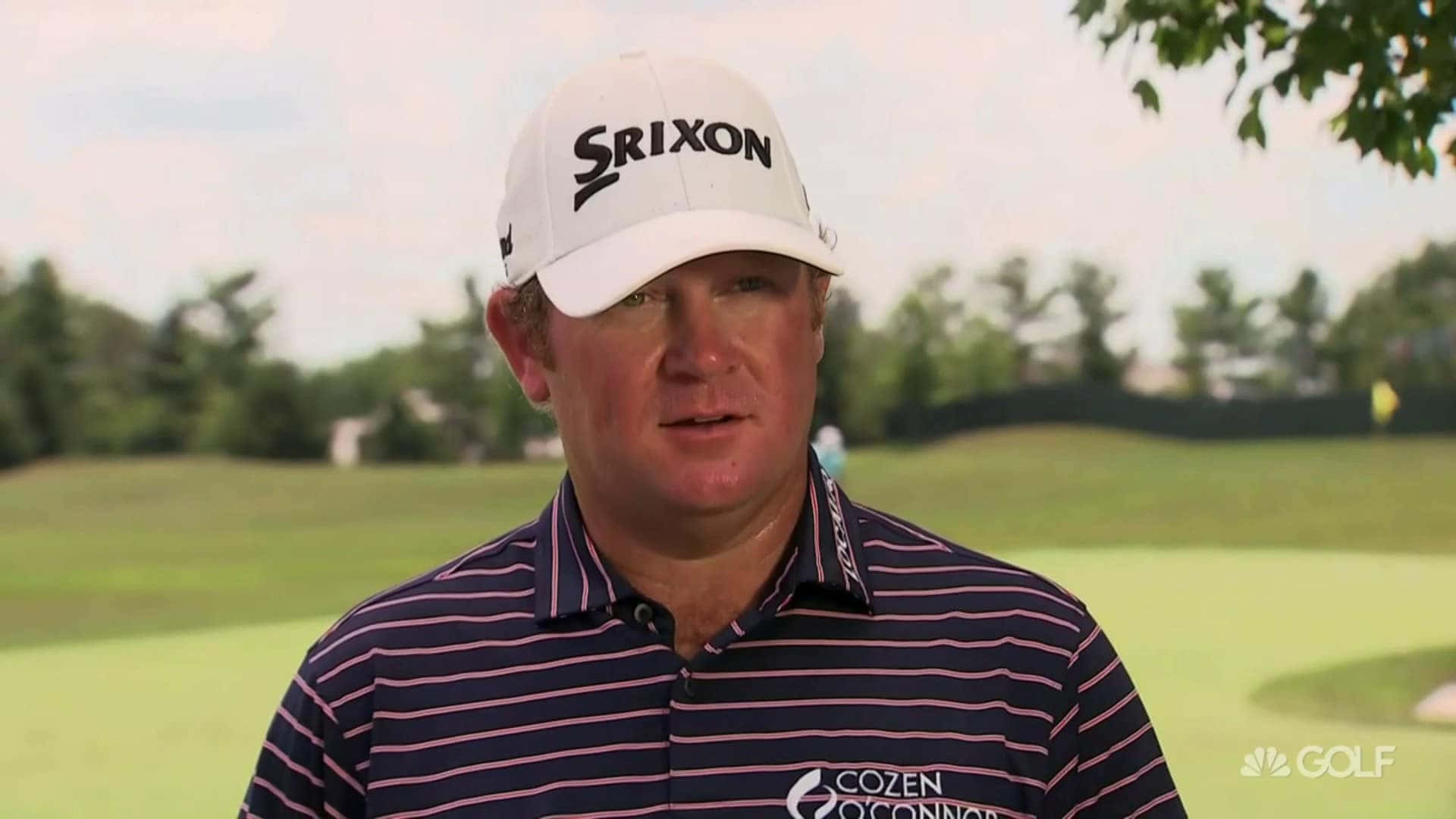 William Mcgirt Wearing A Striped Shirt Background