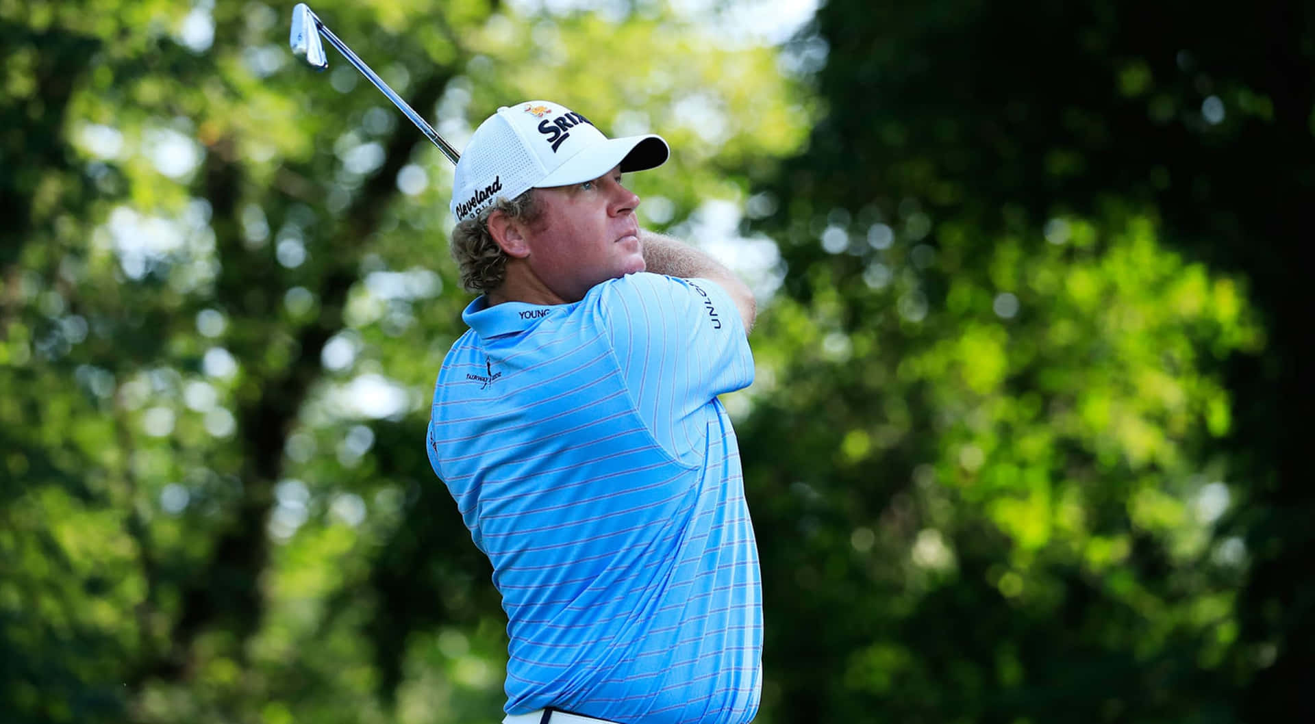 William Mcgirt With A Club Overhead Background