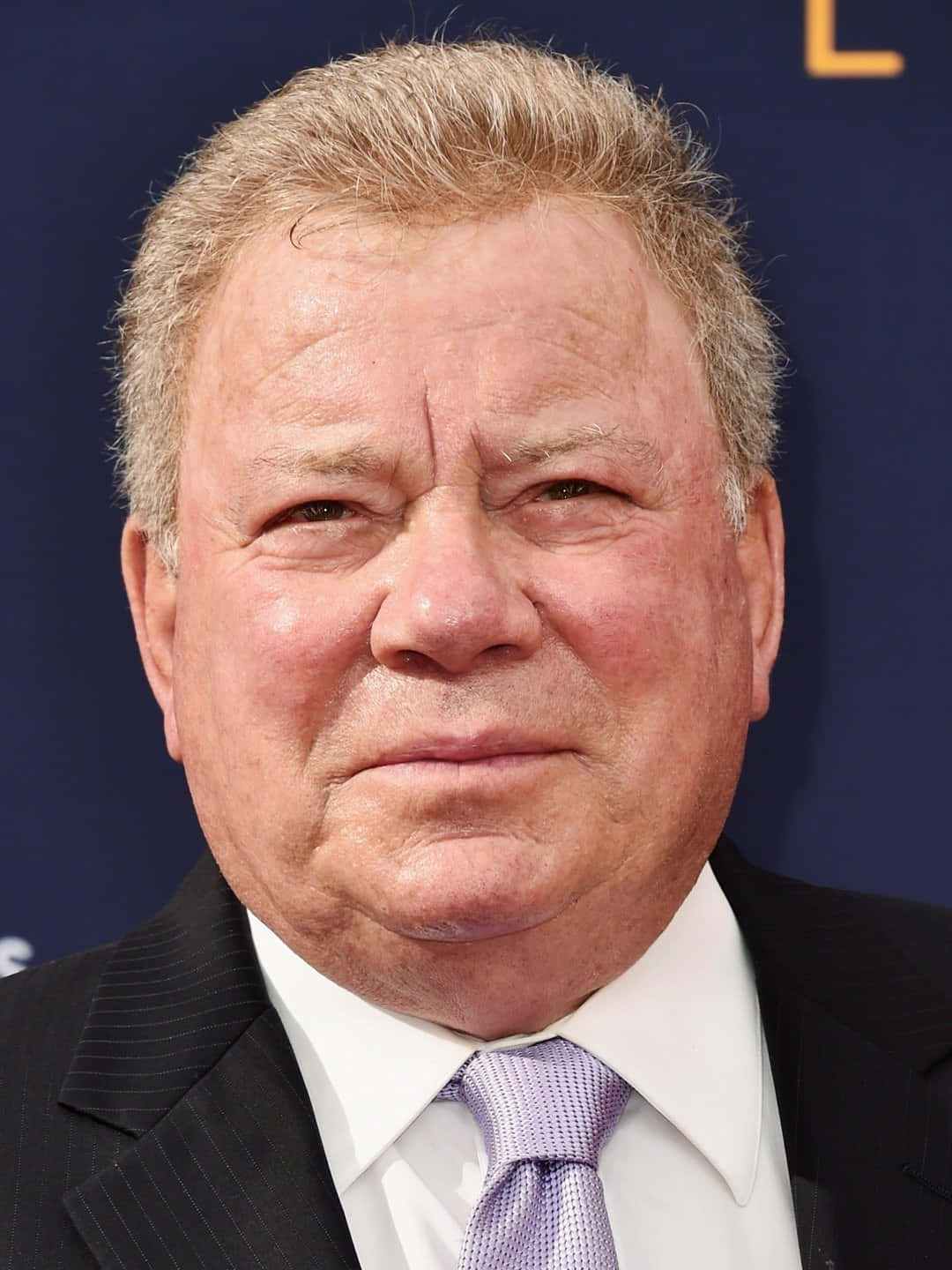 William Shatner Posing Confidently Background