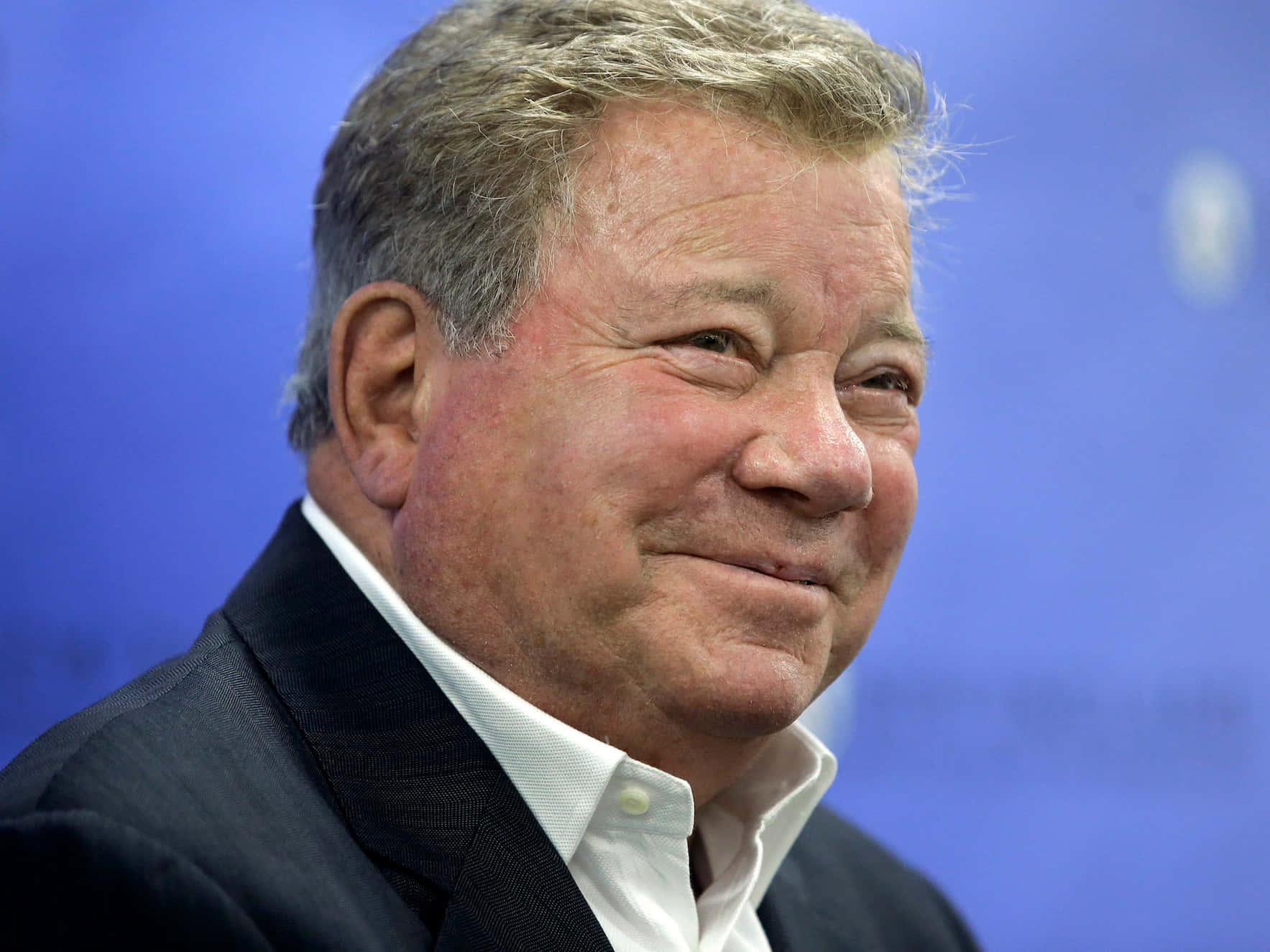 William Shatner Posing In A Classic Portrait Background